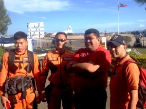 The Philippines Coast Guuard with team leader Butch Hong (centre red shit) at the Cebu military airport.