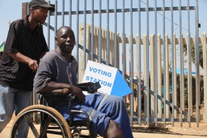 disabled man voting station